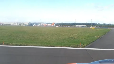 Plane Flight Runway Take Off UK Stock Footage 230458294