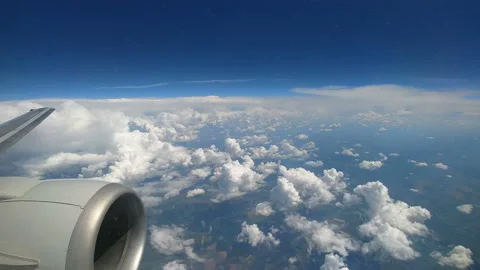 The plane flighting above the picturesque clouds. time lapse Stock-Footage 90904746
