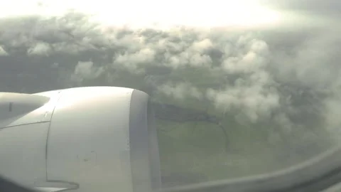 Plane floating through clouds Stock Footage 133576887