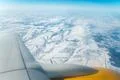 The plane fly on the background of snow Photo