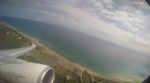 Plane fly over land and sea Video stock 55212812