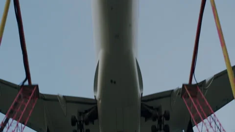 Plane fly overhead early evening and landing at Toronto Pearson Airport Stock Footage 219421386