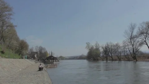 Plane fly under bridge Stock Footage 77064476