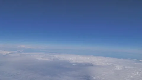 Plane flying above clouds Seq B Pt3 of 5 Stock Footage 240750874