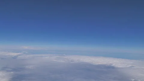 Plane flying above clouds Seq B Pt4 of 5 Stock Footage 240751597