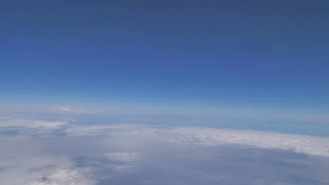 Plane flying above clouds Seq B Pt5 of 5 Stock Footage 240753576