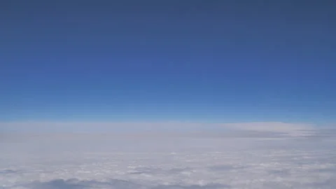 Plane flying above clouds Seq C Pt1 of 60 Stock Footage 240754559