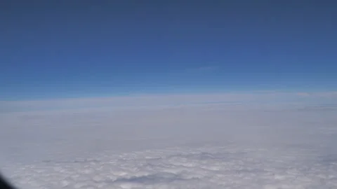 Plane flying above clouds Seq C Pt7 of 60 Stock Footage 240758591