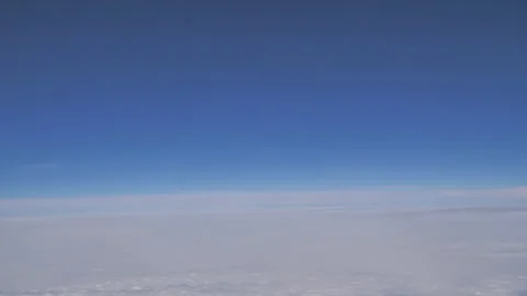 Plane flying above clouds Seq C Pt6 of 60 Stock Footage 240759263