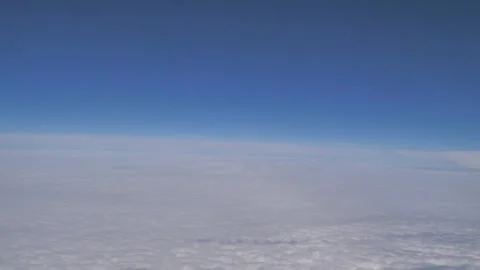 Plane flying above clouds Seq C Pt9 of 60 Stock Footage 240761264