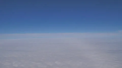 Plane flying above clouds Seq C Pt16 of 60 Stock Footage 240767316