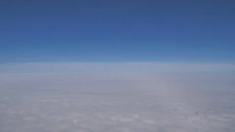 Plane flying above clouds Seq C Pt17 of 60 Stock Footage 240768314