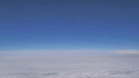Plane flying above clouds Seq C Pt3 of 60 Stock Footage 240839199