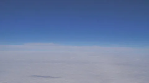 Plane flying above clouds Seq C Pt12 of 60 Stock Footage 240854644