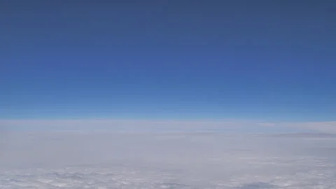 Plane flying above clouds Seq C Pt5 of 60 Stock Footage 240890746