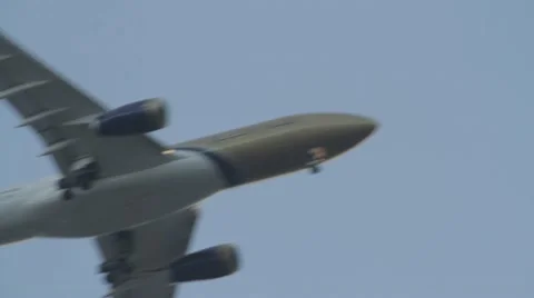 Plane flying across the sky Stock Footage