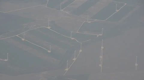 Plane flying, aerial view on windmill Stock Footage 22782316