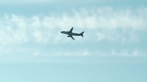 Plane flying at blue sky background Stock Footage 124666135