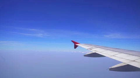 Plane flying with blue sky Stock Footage 82697219