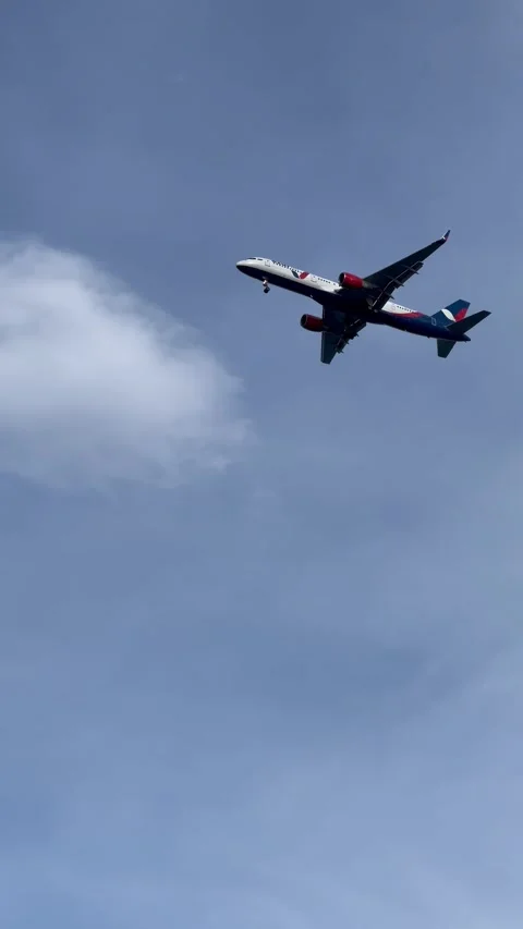Plane flying in blue sky Stock Footage 337111120