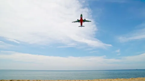 Plane is Flying in the Blue Sky Over the Sea. Passenger Aircraft. Concept of 스톡 동영상 240456057