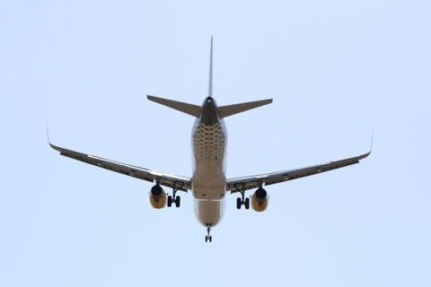 Plane flying with clearly sky Stock Photos