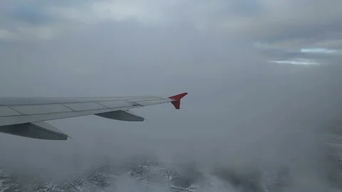 The plane is flying in the clouds Stock-Footage 90514740