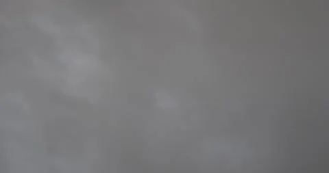 Plane Flying in Cloudy Sky With Rainbow Background Stock Footage 262394495