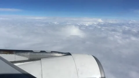 A plane flying high in the sky Stock Footage 162246321