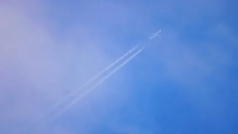 Plane flying high with a trail Stock Footage 158321894