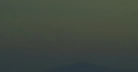 Plane flying on Horizon at Sunset Stock Footage 292725766