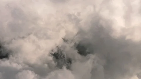 Plane Flying inside White Huge Clouds Vidéo 122379596