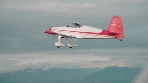 Plane flying in the mid air Stock Footage 93578586