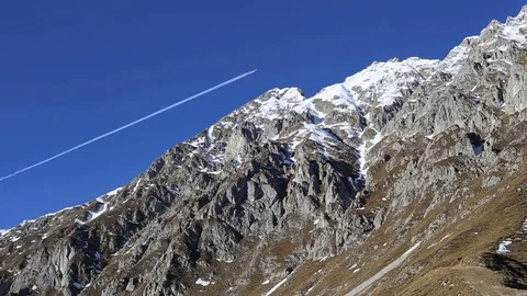 Plane is flying over the Alps Stock Footage 71915690