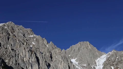 Plane is flying over the Alps Stock Footage 71915789