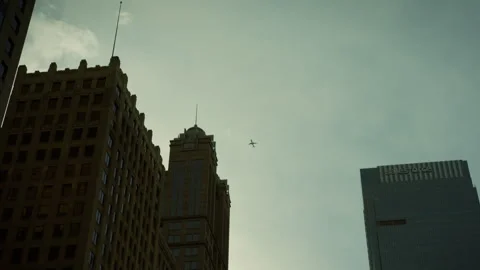 Plane flying over Chicago downtown Stock Footage 243675455