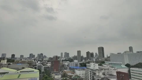 A Plane Flying Over the City Stock Footage 318861282