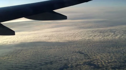 Plane flying over the clouds 7 Stock Footage