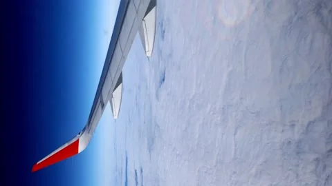 The plane is flying over the clouds. White darkness.Vertical video Stock Footage 167022694