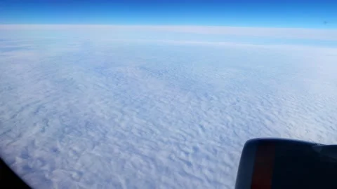 The plane is flying over the clouds. White darkness Stock Footage 167646224