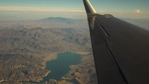 Plane flying over the Colorado River Stock Footage 86147857