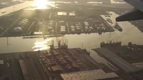 Plane flying over the fields of Amsterdam Stock Footage 89854649