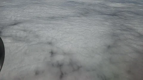 Plane flying over fluffy clouds 库存影片 242452426