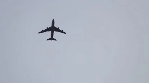 A plane flying over Stock Footage 171125393
