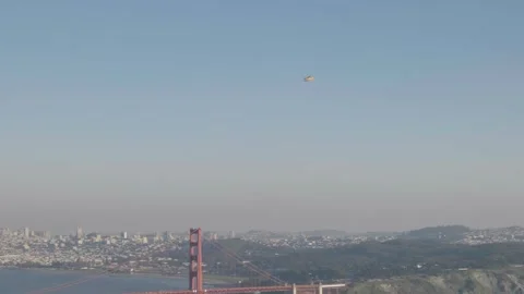 Plane Flying Over The Golden Gate Video stock 255241836