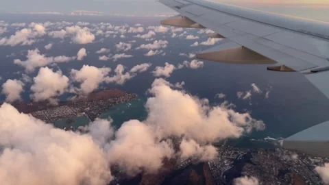 Plane flying over Hawaiian island with w... | Stock Video | Pond5