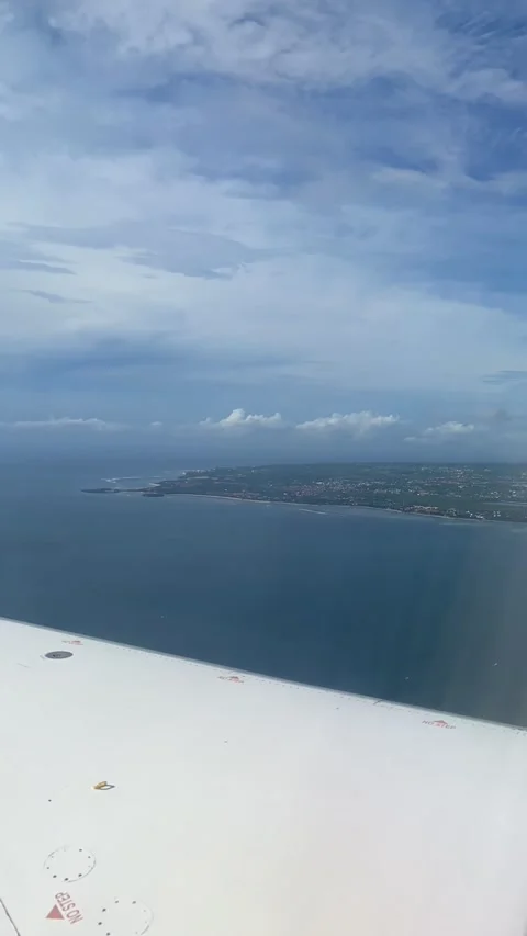 Plane flying over Lombok Stock Footage 343126619