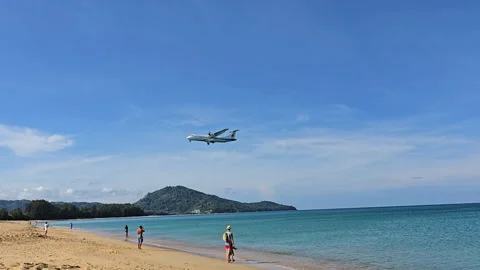 Plane is flying over the ocean Stock Footage 304322144