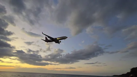 Plane is flying over the ocean Stock Footage 304326035