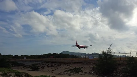 Plane is flying over the ocean Stock Footage 304328864